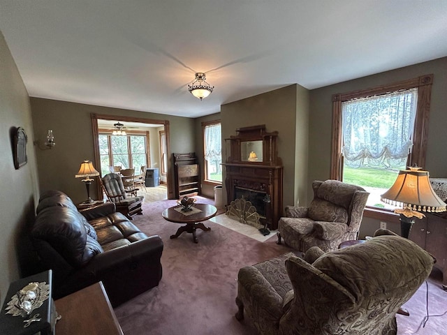 13412 Glacier Rd, Tomah, WI 54660 - carpeted living area featuring a fireplace with flush hearth