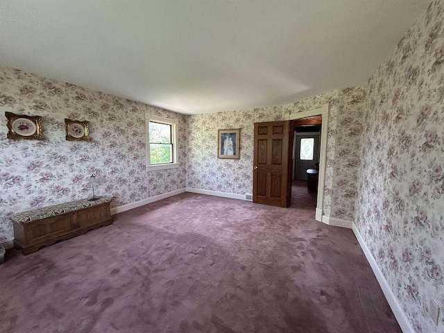 13412 Glacier Rd, Tomah, WI 54660 - carpeted spare room featuring wallpapered walls and baseboards