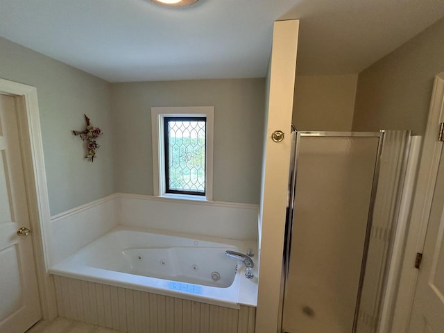 13412 Glacier Rd, Tomah, WI 54660 - full bathroom featuring a stall shower and a tub with jets