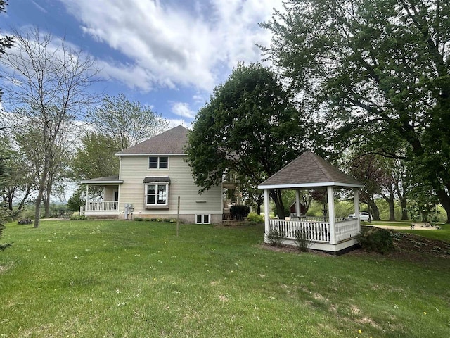 13412 Glacier Rd, Tomah, WI 54660 - rear view of house featuring a gazebo, a lawn, and a porch