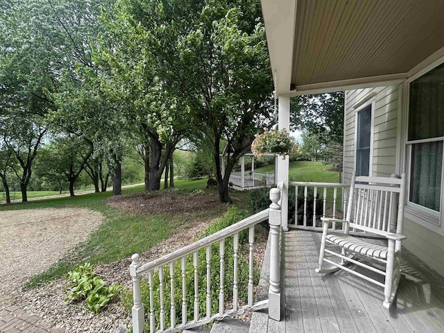 13412 Glacier Rd, Tomah, WI 54660 - wooden terrace featuring a porch