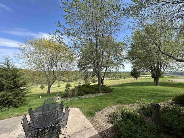 13412 Glacier Rd, Tomah, WI 54660 - view of green lawn with outdoor dining area and a patio area