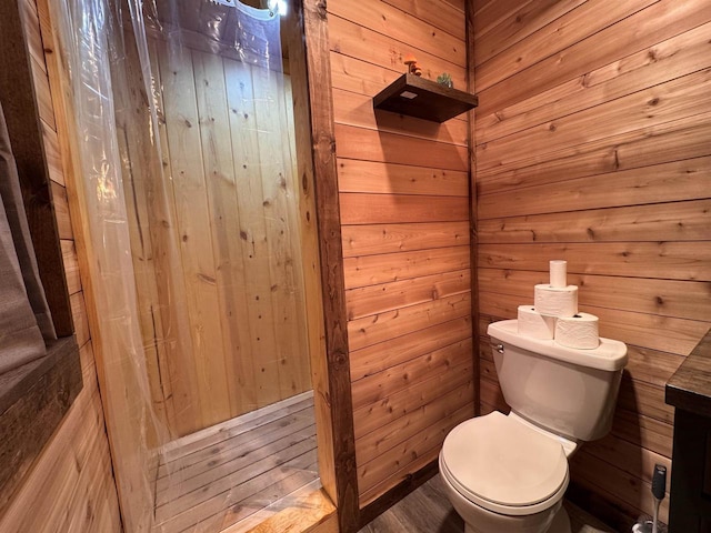 N4755 11th Dr, Montello, WI 53949 - bathroom featuring toilet and wood walls