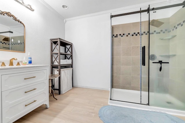 W6870 Czech Ln, Neshkoro, WI 54960 - full bathroom with crown molding, a shower stall, vanity, and wood finished floors