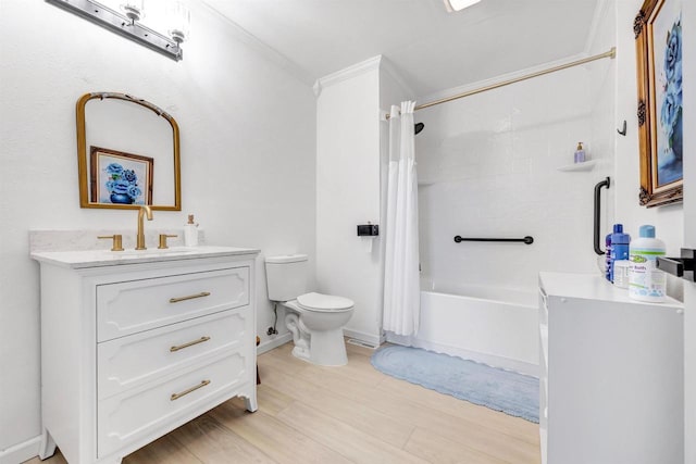 W6870 Czech Ln, Neshkoro, WI 54960 - full bathroom featuring toilet, vanity, shower / bath combo with shower curtain, wood finished floors, and crown molding