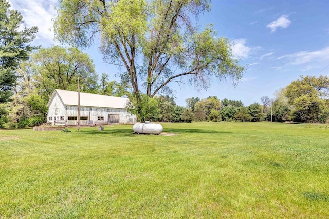 W6870 Czech Ln, Neshkoro, WI 54960 - view of grassy yard featuring an outdoor structure