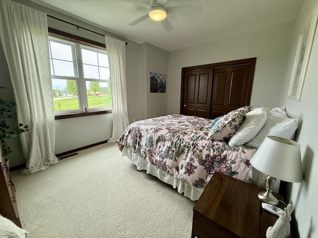515 Fieldstone Ct, Tomah, WI 54660 - bedroom with carpet floors, baseboards, and ceiling fan