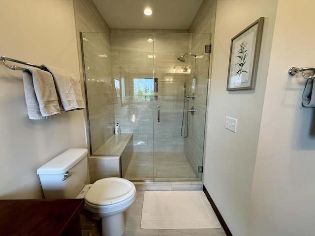 515 Fieldstone Ct, Tomah, WI 54660 - full bathroom featuring toilet, a shower stall, tile patterned flooring, and recessed lighting