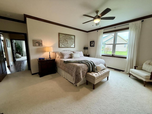 515 Fieldstone Ct, Tomah, WI 54660 - bedroom featuring light carpet, crown molding, a ceiling fan, and baseboards