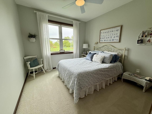 515 Fieldstone Ct, Tomah, WI 54660 - bedroom featuring light carpet, ceiling fan, and baseboards