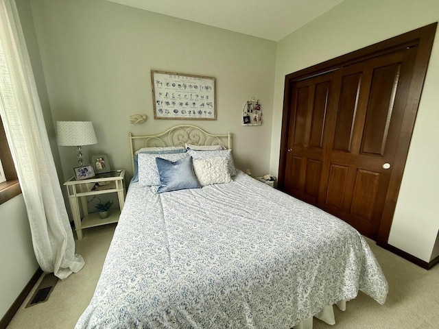 515 Fieldstone Ct, Tomah, WI 54660 - carpeted bedroom with a closet and baseboards