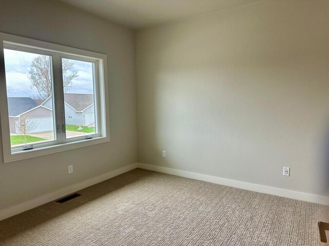 365 N Wilson St, Kimberly, WI 54136 - carpeted spare room with baseboards