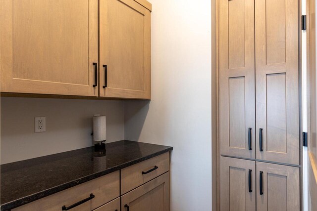 365 N Wilson St, Kimberly, WI 54136 - kitchen featuring dark stone countertops