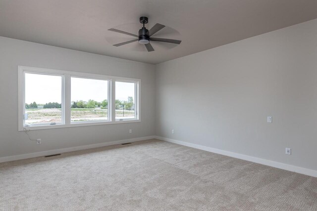 365 N Wilson St, Kimberly, WI 54136 - empty room with baseboards, a ceiling fan, and light colored carpet