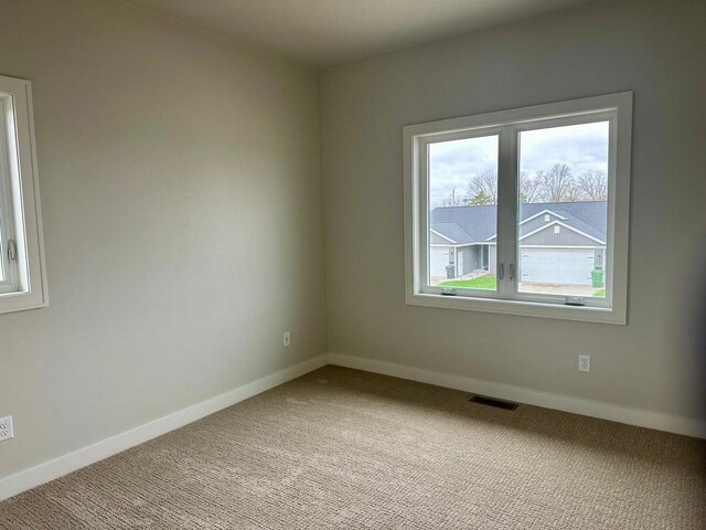 365 N Wilson St, Kimberly, WI 54136 - carpeted spare room with baseboards