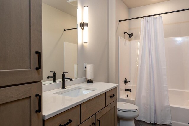 365 N Wilson St, Kimberly, WI 54136 - bathroom featuring shower / tub combo with curtain, toilet, and vanity