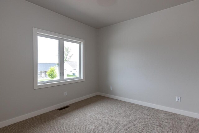 365 N Wilson St, Kimberly, WI 54136 - carpeted spare room with baseboards