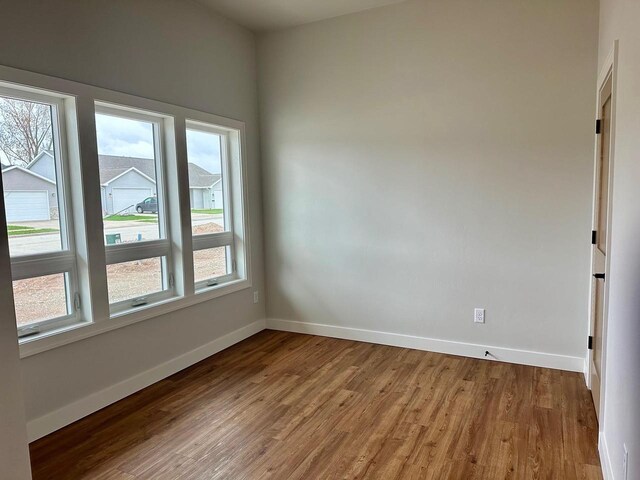 365 N Wilson St, Kimberly, WI 54136 - empty room with wood finished floors and baseboards