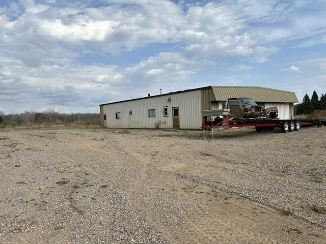 188 County Rd N, Birnamwood, WI 54414 - view of pole building featuring driveway