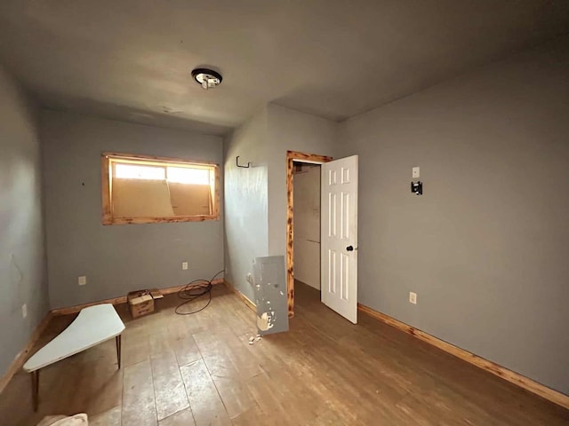 188 County Rd N, Birnamwood, WI 54414 - unfurnished bedroom with light wood-style floors and baseboards
