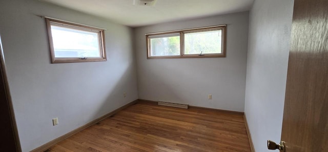 2905 S 18th St, Sheboygan, WI 53081 - empty room with wood finished floors and baseboards