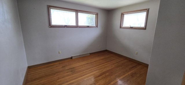 2905 S 18th St, Sheboygan, WI 53081 - unfurnished room featuring wood finished floors and baseboards
