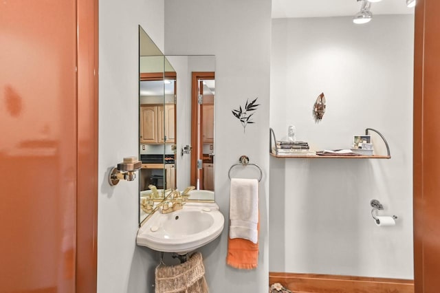 1830 E Kane Pl Unit 3, Milwaukee, WI 53202 - bathroom with a sink and baseboards