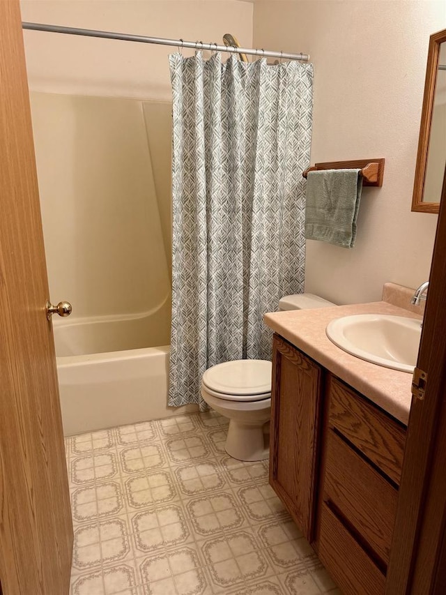 W9519 Skogen Rd, Cambridge, WI 53523 - bathroom featuring toilet, shower / bathtub combination with curtain, vanity, and tile patterned floors