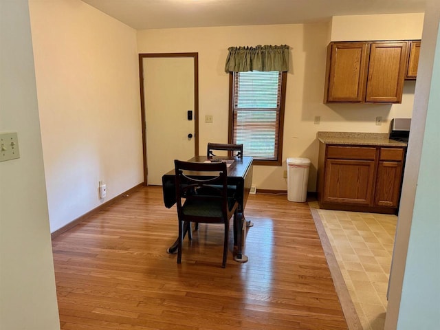 W9519 Skogen Rd, Cambridge, WI 53523 - dining area featuring light wood finished floors and baseboards