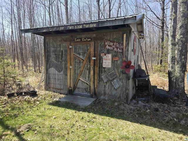2284 Spirit Ln, La Pointe, WI 54850 - view of outdoor structure featuring an outbuilding and a forest view