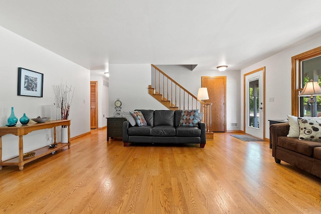 430 Fairview Way, Shawano, WI 54166 - living area with stairway and light wood-type flooring