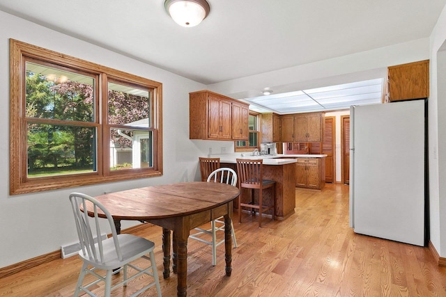 430 Fairview Way, Shawano, WI 54166 - dining room featuring light wood-style flooring and baseboards