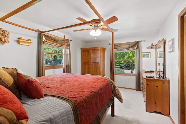 430 Fairview Way, Shawano, WI 54166 - bedroom with light colored carpet, multiple windows, and a ceiling fan