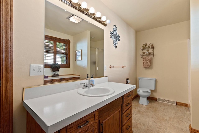 430 Fairview Way, Shawano, WI 54166 - full bath featuring vanity, toilet, a shower with shower door, baseboards, and tile patterned floors