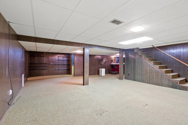 430 Fairview Way, Shawano, WI 54166 - finished below grade area featuring wooden walls, stairway, carpet floors, and a paneled ceiling