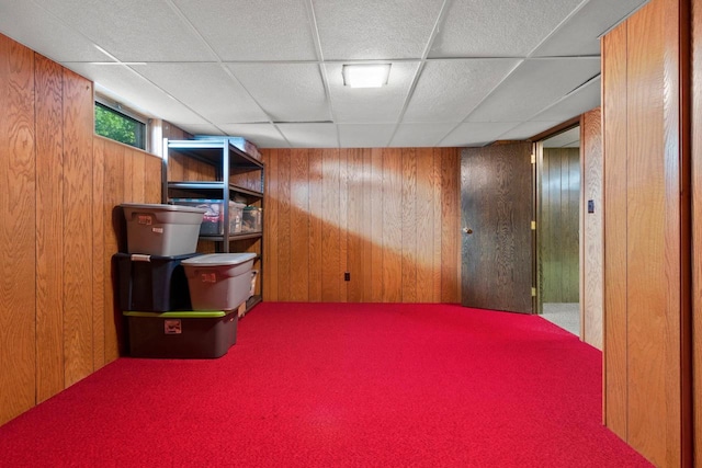 430 Fairview Way, Shawano, WI 54166 - basement featuring wood walls, a drop ceiling, and carpet