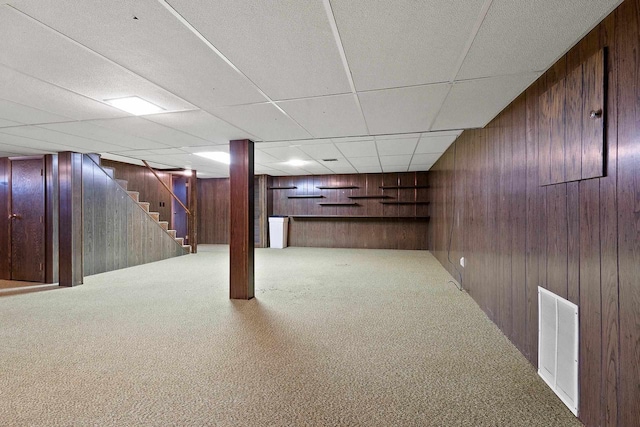 430 Fairview Way, Shawano, WI 54166 - finished below grade area featuring wooden walls, stairs, carpet, and a drop ceiling