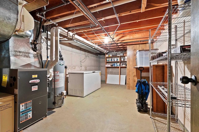 430 Fairview Way, Shawano, WI 54166 - unfinished basement featuring white fridge and gas water heater