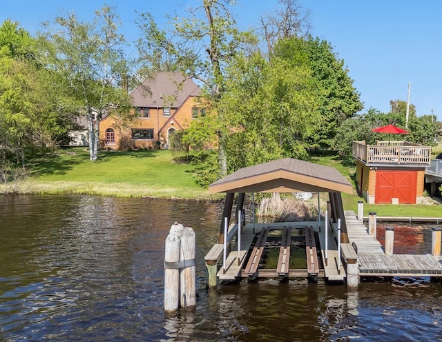 109 Doty St, Fremont, WI 54940 - dock featuring boat lift, a yard, and a water view