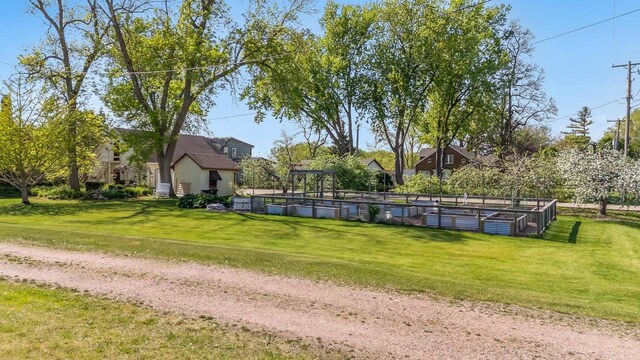 109 Doty St, Fremont, WI 54940 - view of property's community featuring a garden and a lawn