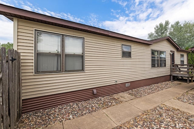 26 Westminster Ave, Holmen, WI 54636 - view of side of home with crawl space and a deck