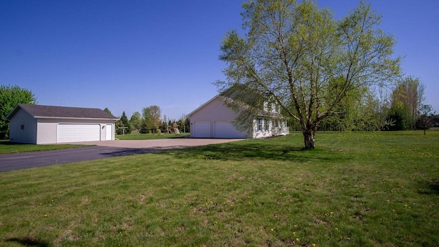 13213 138th Ave, Chippewa Falls, WI 54729 - view of front of house with an outbuilding and a front yard