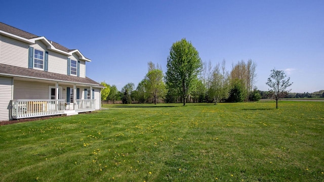 13213 138th Ave, Chippewa Falls, WI 54729 - view of green lawn with a porch