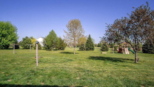 13213 138th Ave, Chippewa Falls, WI 54729 - view of grassy yard featuring a playground