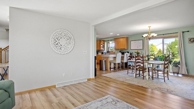 13213 138th Ave, Chippewa Falls, WI 54729 - dining space featuring a chandelier, light wood-style floors, plenty of natural light, and recessed lighting