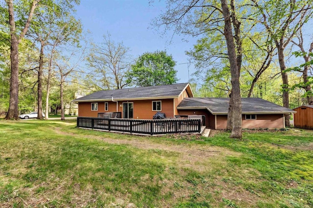 600 Honey Bear Ct, Waupaca, WI 54981 - rear view of property with a yard and a wooden deck