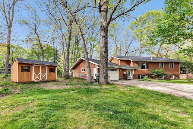 600 Honey Bear Ct, Waupaca, WI 54981 - view of front of property featuring driveway, a garage, and a front yard