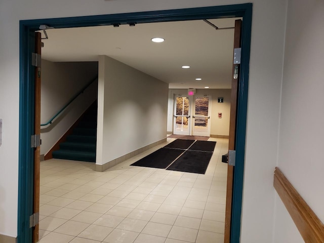 111 Center St Unit 355, Lake Geneva, WI 53147 - corridor with recessed lighting, stairway, baseboards, tile patterned floors, and french doors