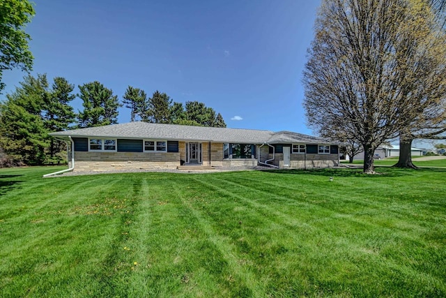 7628 W Mineral Point Rd, Verona, WI 53593 - view of front of home with stone siding and a front lawn