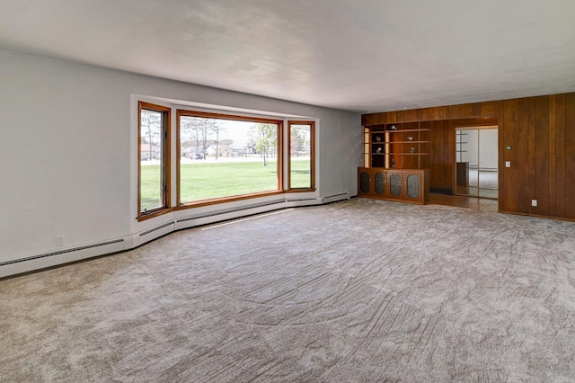 7628 W Mineral Point Rd, Verona, WI 53593 - unfurnished living room with wooden walls, carpet, and baseboards